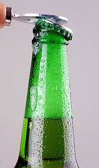 Image showing Beer bottle being opened