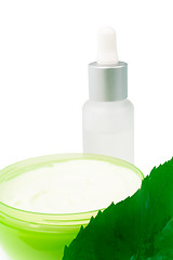 Image showing cosmetic products with green leaf 