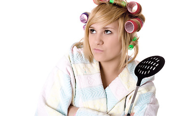 Image showing  funny housewife with curlers and skimmer