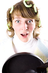 Image showing crazy housewife with pan