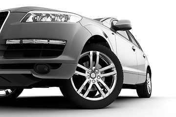 Image showing Car front bumper, light and wheel on white