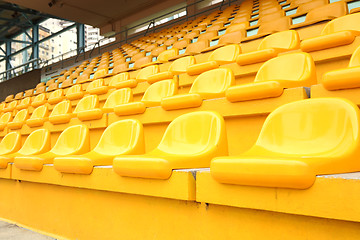 Image showing Yellow chairs inside the stadium