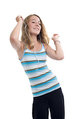 Image showing teenager with mp3 player dancing