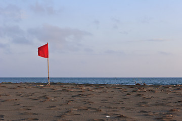 Image showing red flag on beach