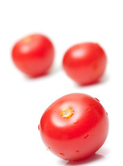 Image showing fresh tomatoes on white background