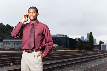 Image showing Black businessman on the phone