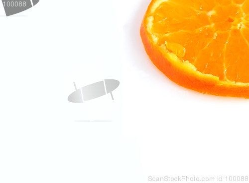 Image of slice of orange in the corner of the picture