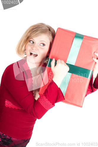 Image of Happy woman with Christmas presents