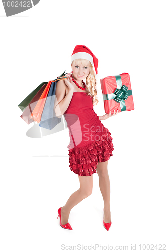 Image of Happy woman with Christmas presents