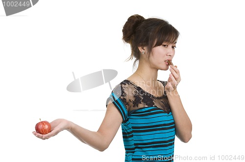 Image of woman with chocolate and apple