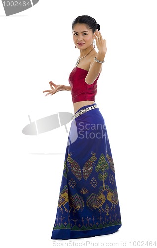 Image of asian dancing in traditional clothes