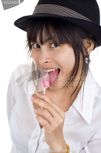 Image of young woman with lollipop
