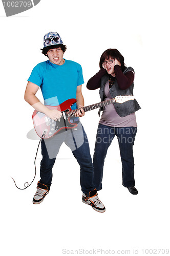 Image of Teen boy with guitar.