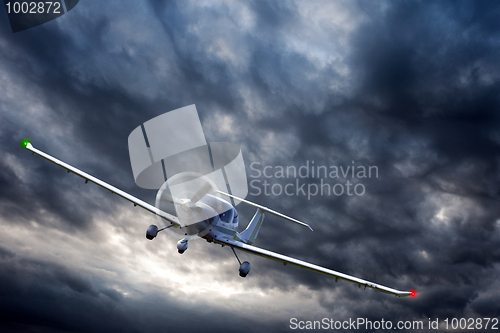 Image of Aircraft escaping the storm