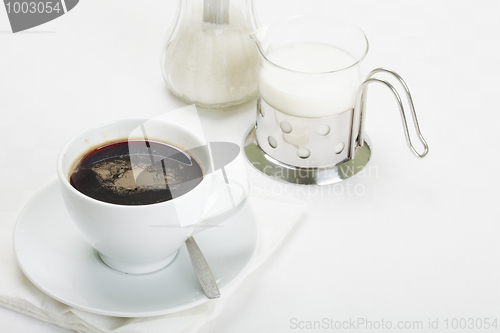 Image of Coffee with milk and sugar