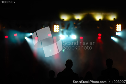 Image of crowd and spotlights