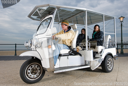 Image of Solar powered tuc tuc at the beach