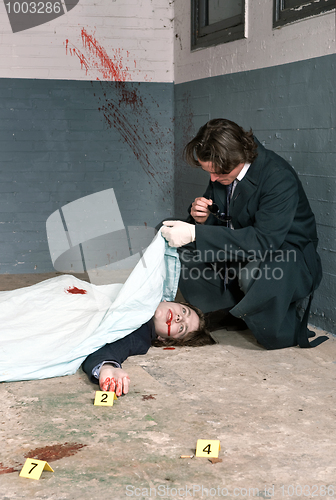 Image of Examining a corpse