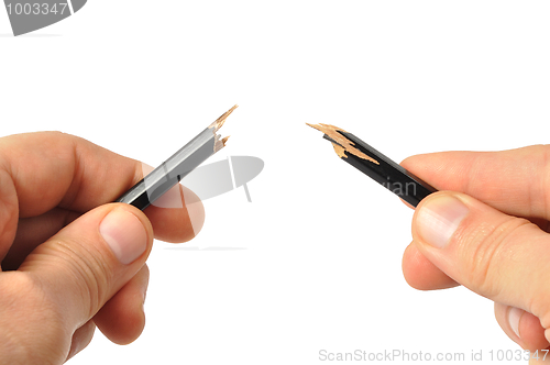 Image of Hands with Broken Pencil