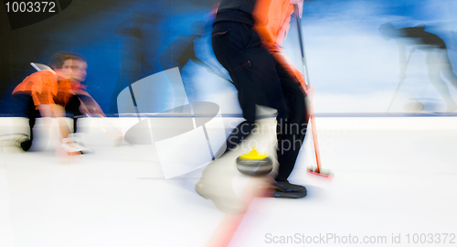 Image of Delivering a curling stone