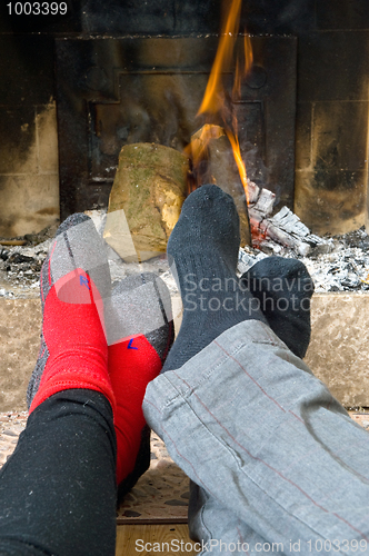 Image of Warming by the fire
