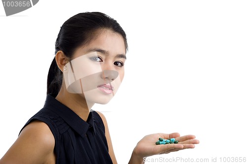 Image of woman with pills