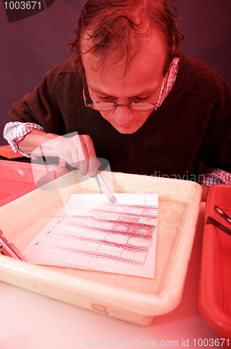 Image of Examining a print