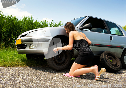 Image of Changing a flat tire