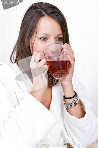 Image of Woman drinking tea