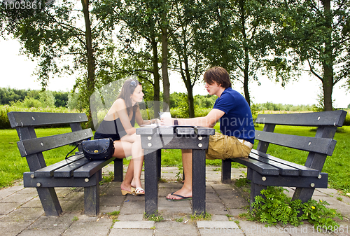 Image of Couple at picnic table