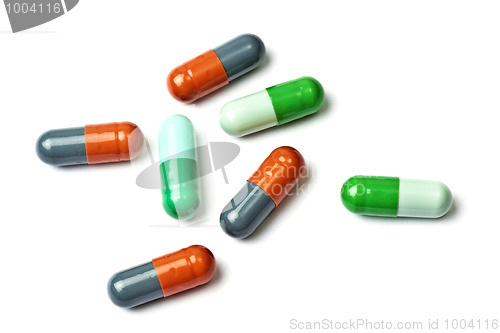 Image of A few colorful capsules isolated on white 