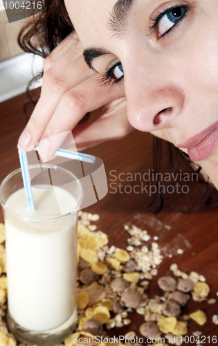 Image of Young people eating milk with cereals