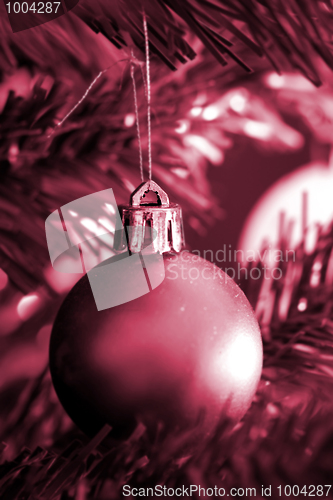 Image of Christmas ornaments on tree.