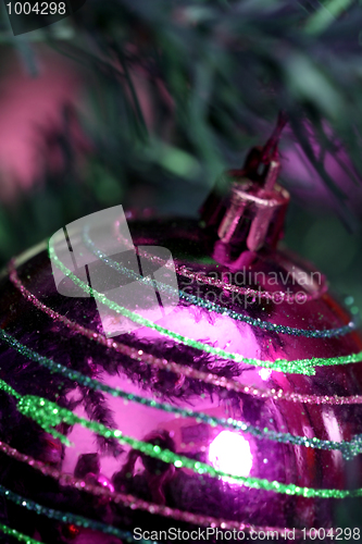 Image of Christmas ornaments on tree.