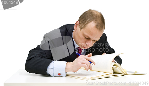 Image of Studying businessman