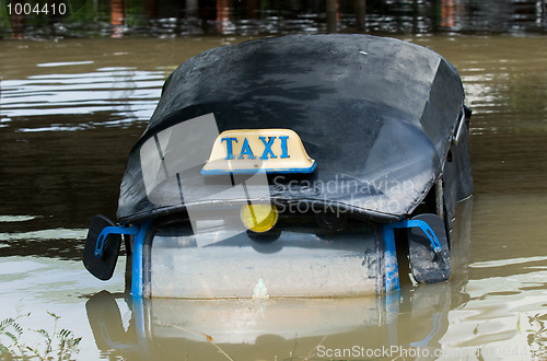 Image of Drowned tuk-tuk taxi in Thailand