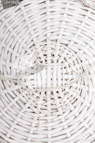 Image of Braided basket in the manner of background