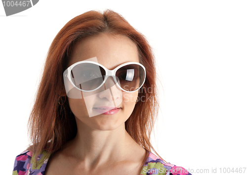 Image of Portrait of the beautiful girl in sunglasseses