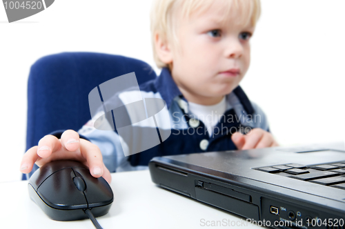 Image of Young Boy Using Laptop