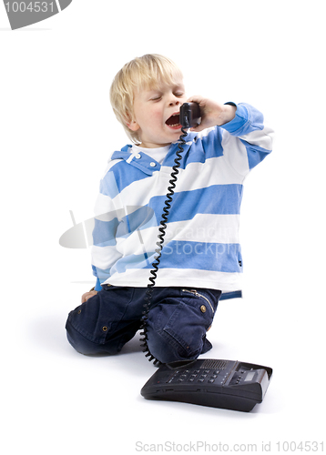 Image of Small boy on the phone