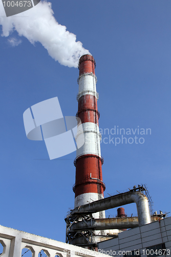 Image of factory chimneys with smoke