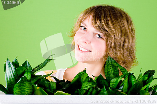 Image of happy girl with plants 