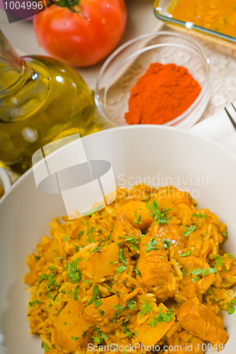 Image of curry beef rice and potatoes