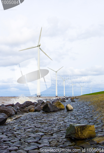 Image of Wind turbines in a row