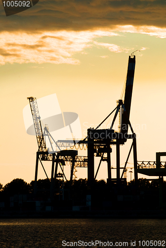 Image of Harbor crane silhouettes