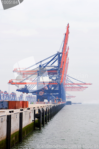 Image of Harbor cranes in the mist