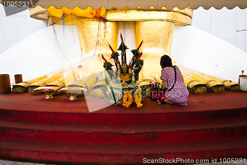 Image of in front of big standing buddha foot 