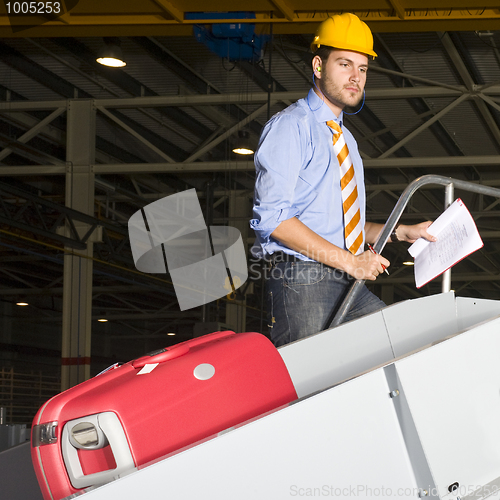 Image of Inspecten a baggage handling line