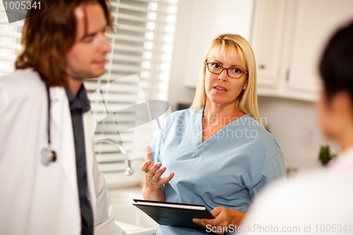 Image of Doctors and Nurses Having Conversation