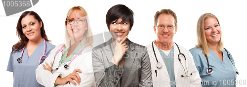 Image of Young Multiethnic Woman with Doctors and Nurses Behind
